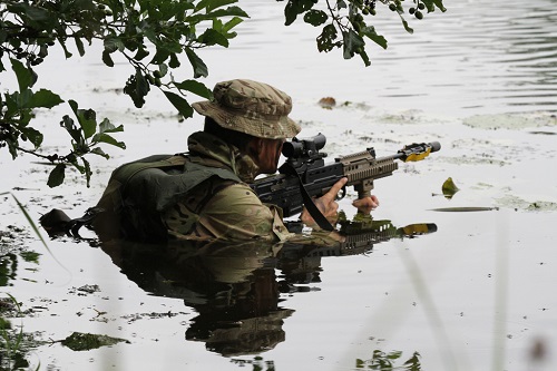 HAC troops on tour doing a stretcher race