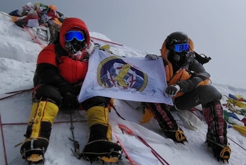 Special Constables with a happy child